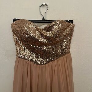 This is a blush pink small sequin mini dress. Only worn once.